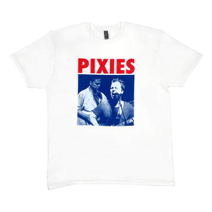 A white T Shirt against a white background that has red text reading "PIXIES" at the top with a blue photo design of the band performing.