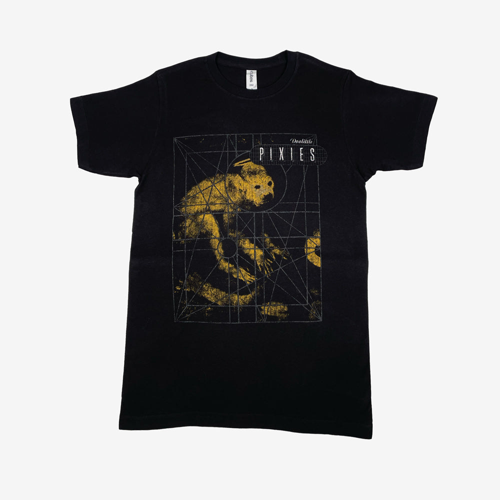 A black t shirt against a white background with a design of a yellow monkey surrounded by a gray grid design. On the top right is white text reading "Pixies" above this is white text reading "Doolittle"