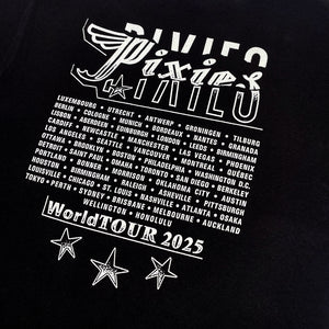 Close up of the back of a black t shirt with a white text logo reading "Pixies" followed by all 2025 Tour dates. Below is white text reading "World Tour 2025" with white stars  underneath.